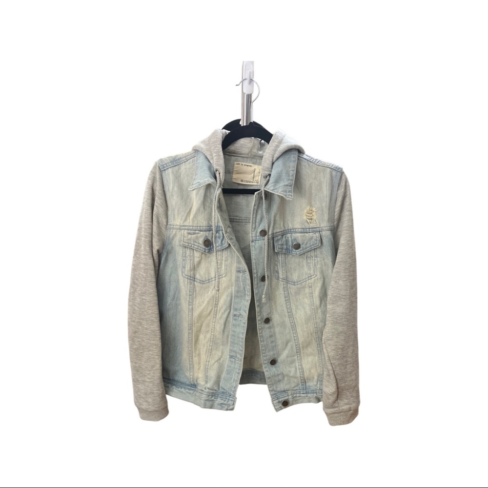 Light denim jacket with sweater sleeves and hoodie.